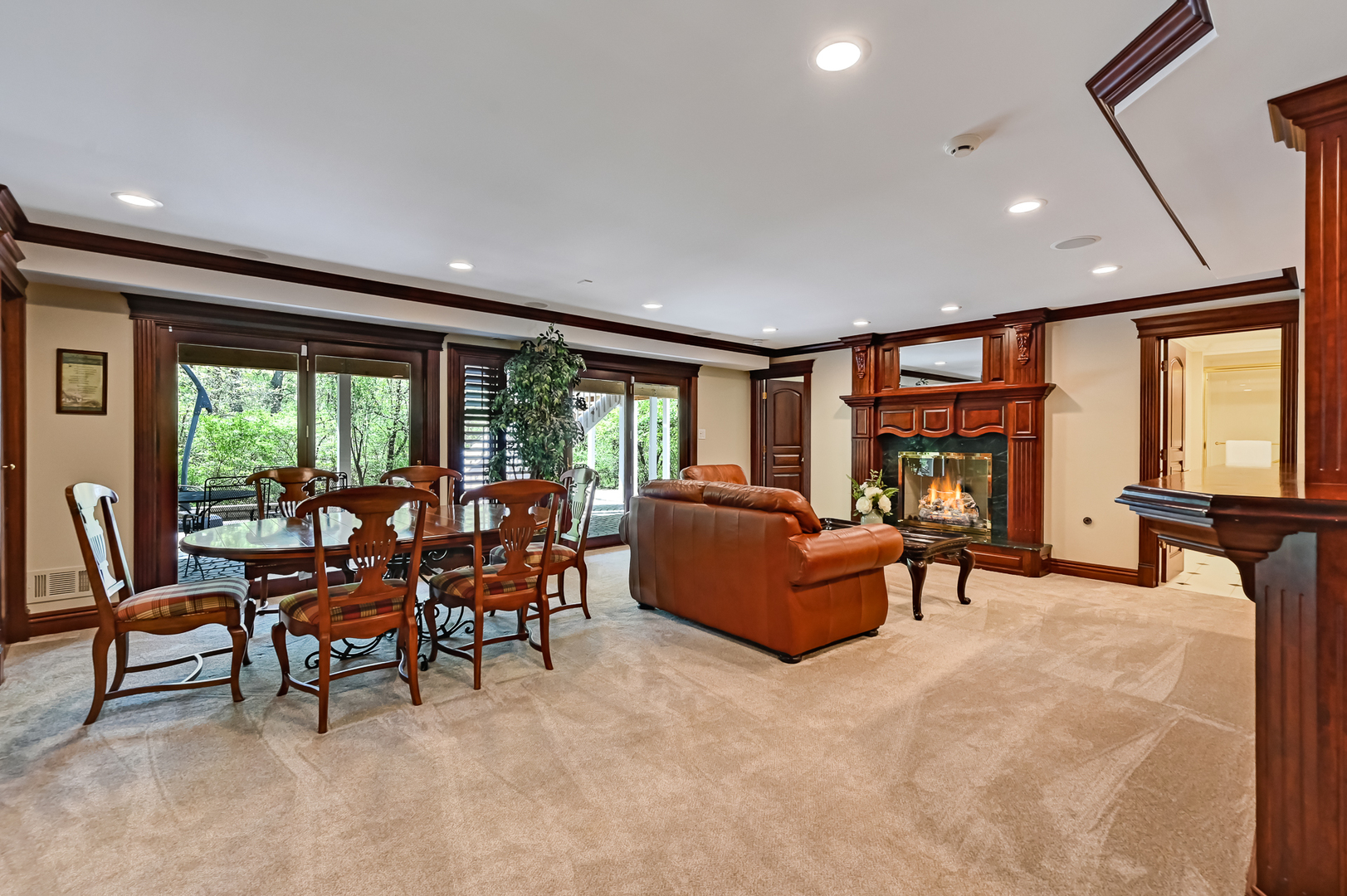 9301 Falling Waters Drive East Burr Ridge, IL 60527 - Photo 35 of 52 a living room with furniture and a large window