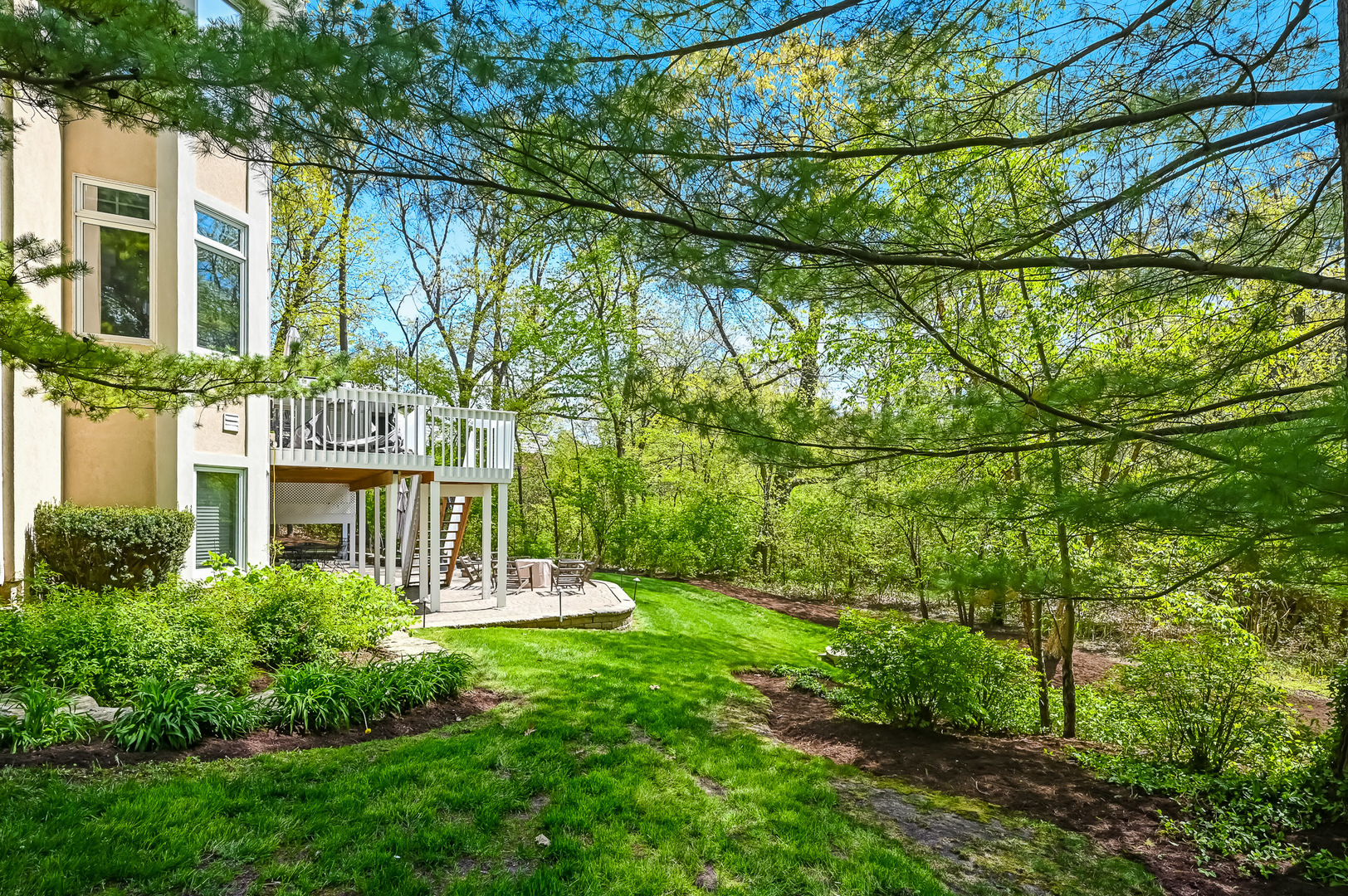 9301 Falling Waters Drive East Burr Ridge, IL 60527 - Photo 42 of 52 a view of a house with a yard