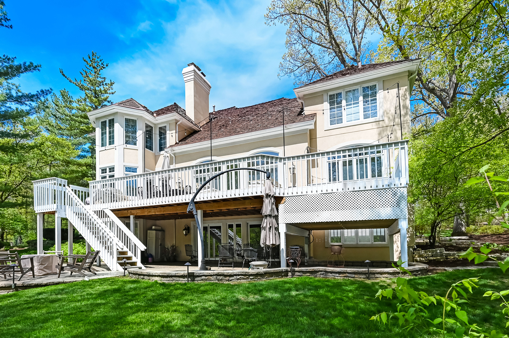 9301 Falling Waters Drive East Burr Ridge, IL 60527 - Photo 45 of 52 a front view of a house with a yard