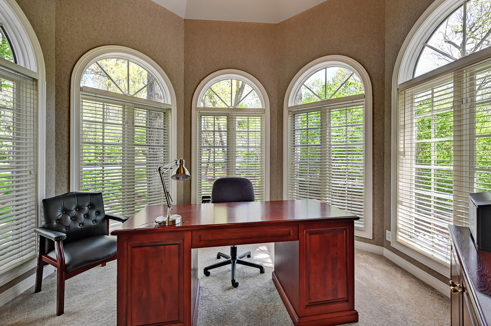 9301 Falling Waters Drive East Burr Ridge, IL 60527 - Photo 8 of 52 a view of a room with a large window and furniture