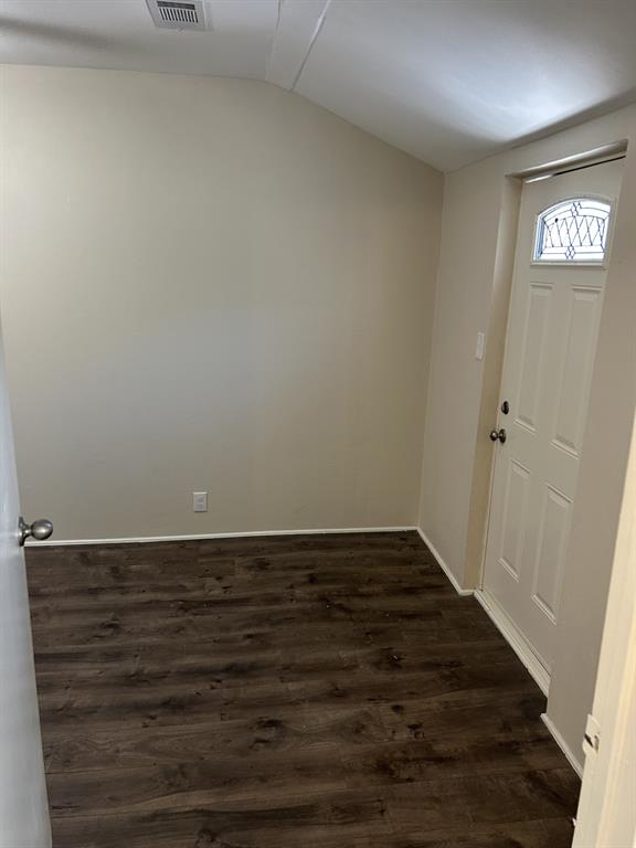 6318 Belgrade Avenue Dallas, TX 75227 - Photo 8 of 23 a view of an empty room and wooden floor