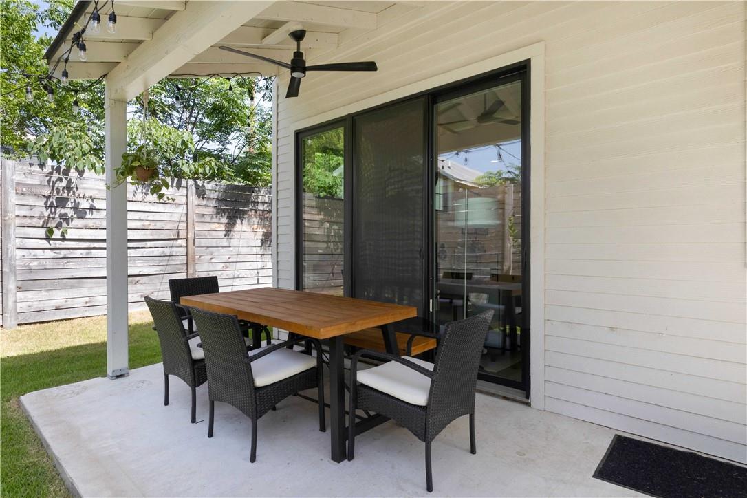2002 East 9th Street, Unit 2 Austin, TX 78702 - Photo 18 of 32 An inviting outdoor living space features a covered patio perfect for al fresco dining.