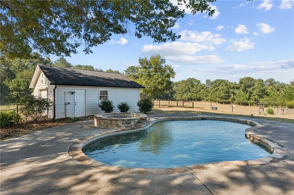 2740 Talley Lane Buford, GA 30519 - Photo 12 of 16 a view of a house with pool and sitting area