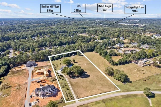 an aerial view of a house with a garden
