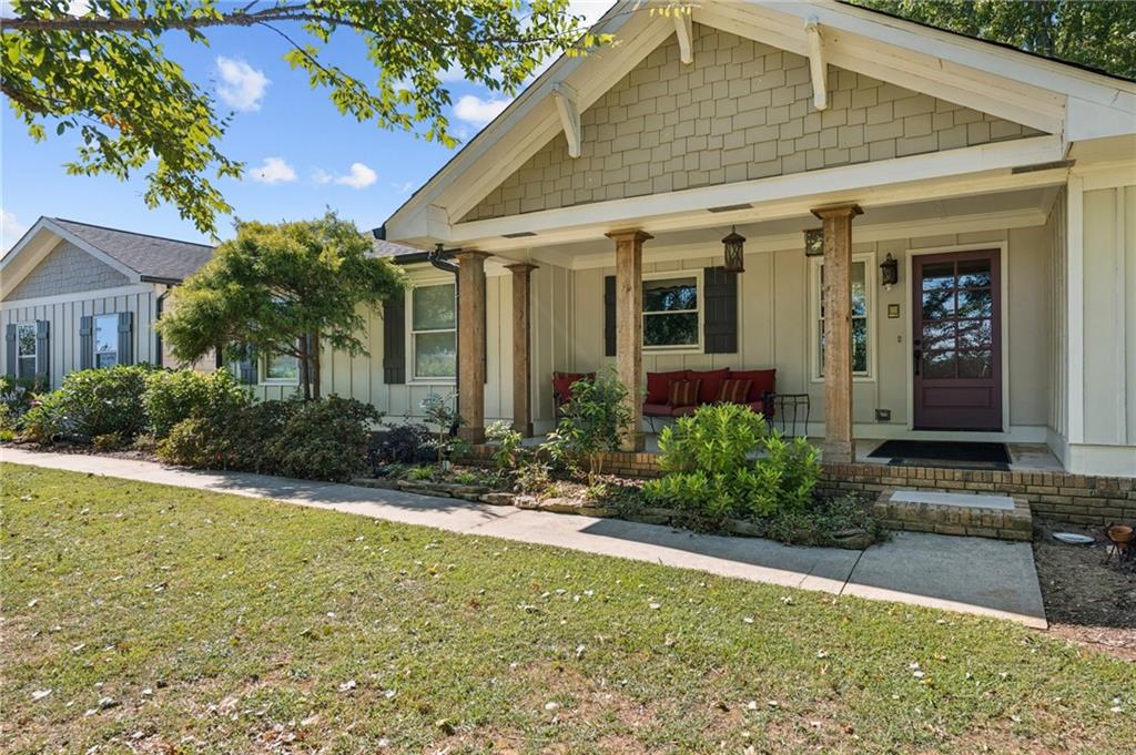 2740 Talley Lane Buford, GA 30519 - Photo 9 of 16 a front view of a house with garden