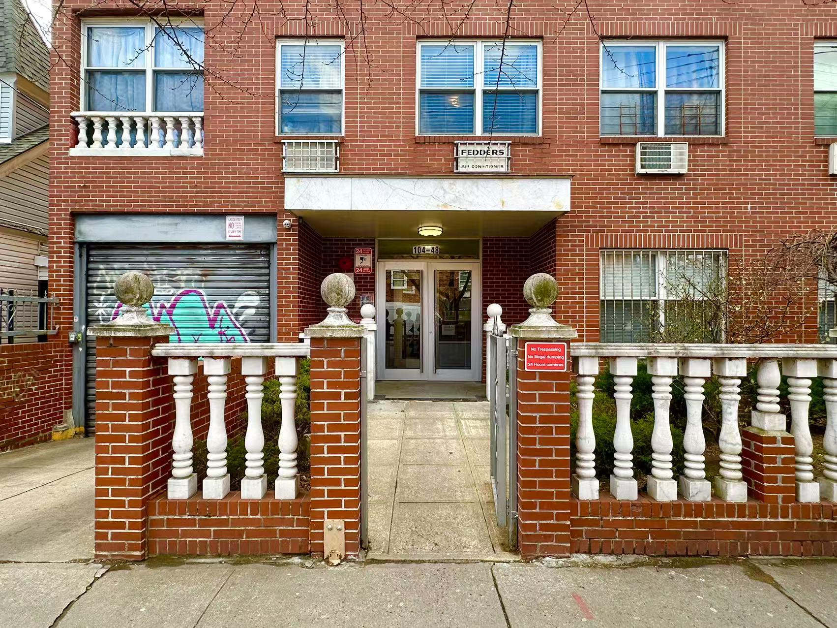 104-48 37th Drive, Unit 2 Queens, NY 11368 - Photo 2 of 15 View of front of home