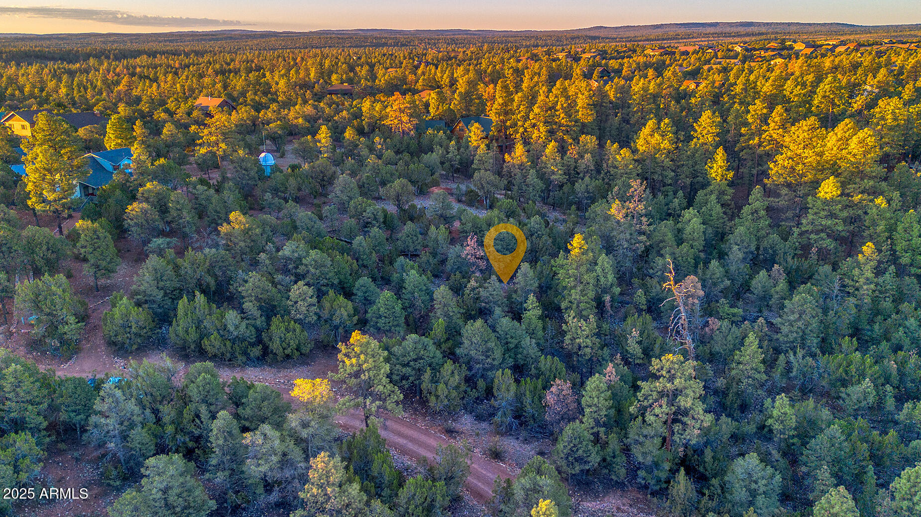 2333 Elk Ridge Lane, Unit 4H Overgaard, AZ 85933 - Photo 18 of 21 an aerial view of a house with a yard and lake view