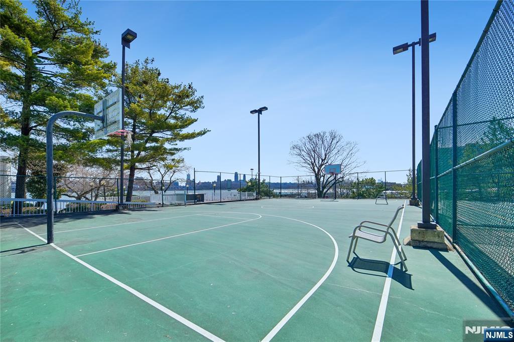 1055 River Road, Unit 302 Edgewater, NJ 07020 - Photo 13 of 17 a view of a tennis court