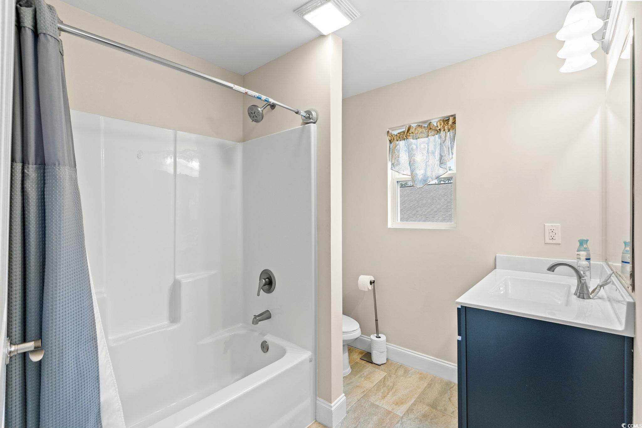 1209 Wehler Court Conway, SC 29526 - Photo 18 of 32 Full bathroom featuring shower / tub combo with curtain and vanity