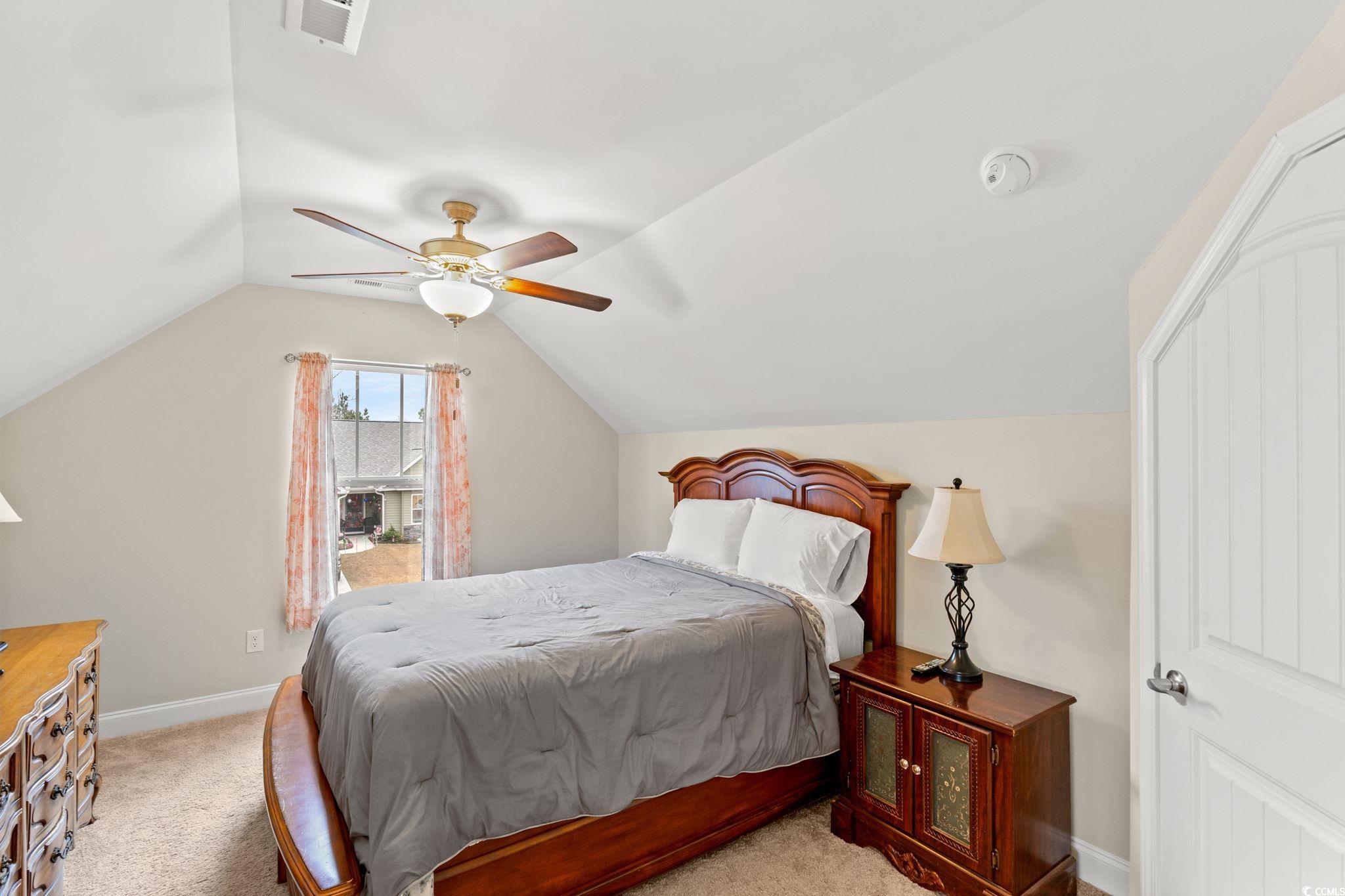 1209 Wehler Court Conway, SC 29526 - Photo 20 of 32 Bedroom with lofted ceiling, light carpet, and ceiling fan