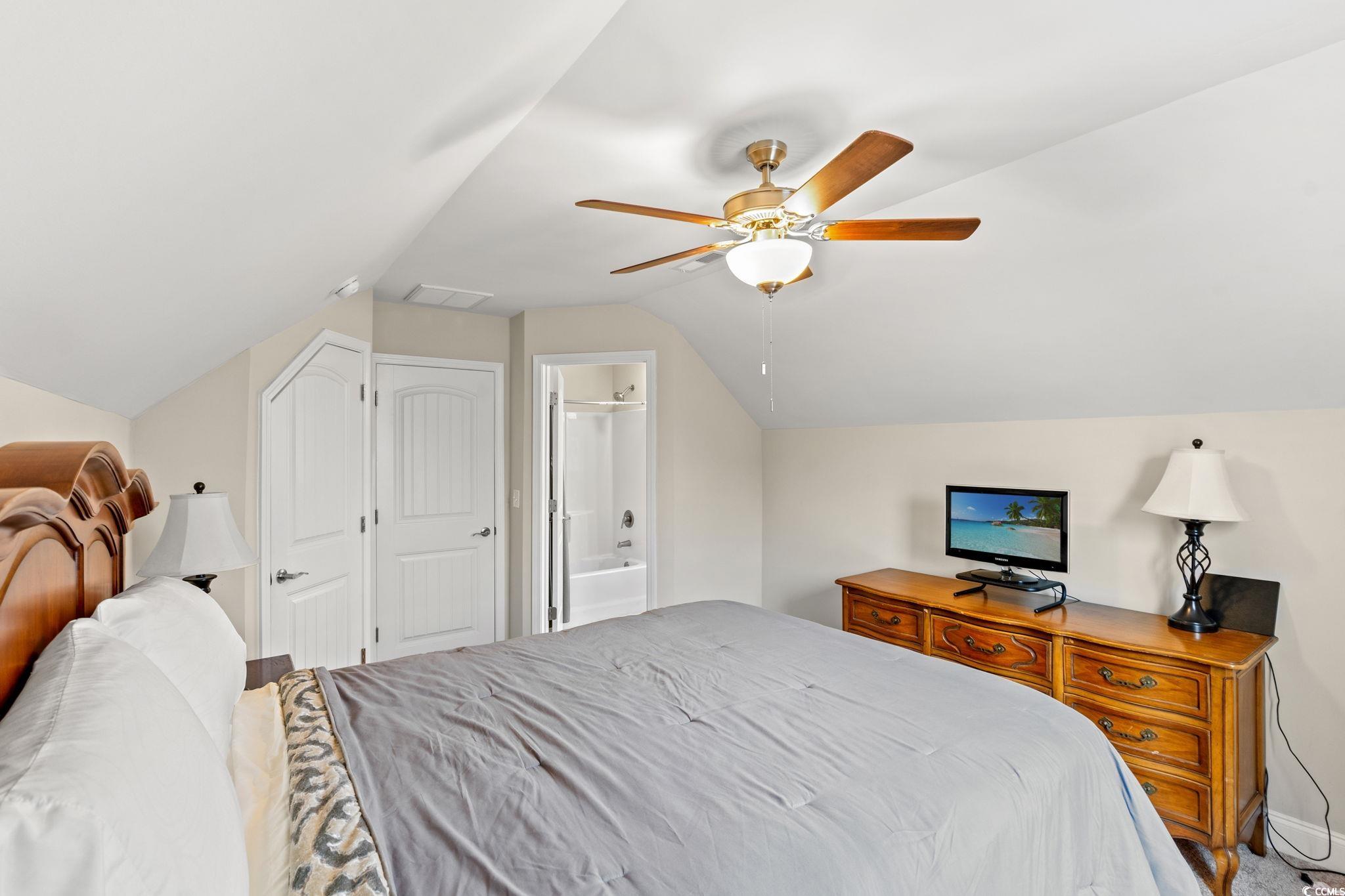 1209 Wehler Court Conway, SC 29526 - Photo 21 of 32 Bedroom featuring lofted ceiling, a ceiling fan, and connected bathroom