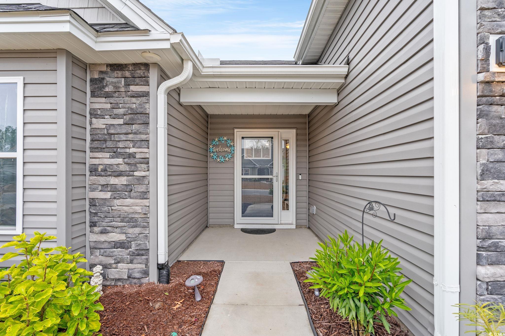 1209 Wehler Court Conway, SC 29526 - Photo 3 of 32 Property entrance featuring stone siding