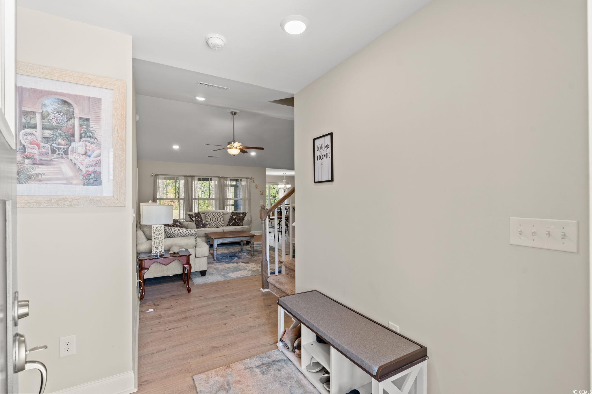 1209 Wehler Court Conway, SC 29526 - Photo 4 of 32 Hall with light wood-style floors, stairway, and vaulted ceiling