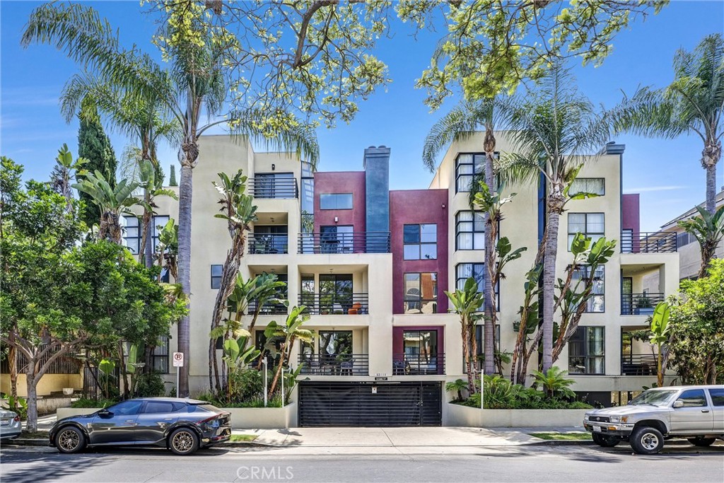 12000 Goshen Avenue, Unit 102 Los Angeles, CA 90049 - Photo 1 of 1 a car parked in front of a building