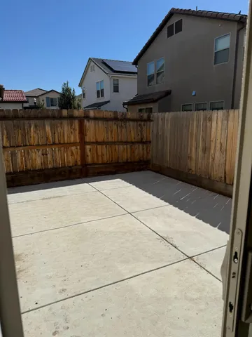 a view of deck with wooden fence