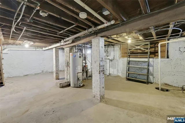 a view of an empty room with storage