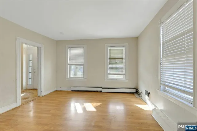 an empty room with windows