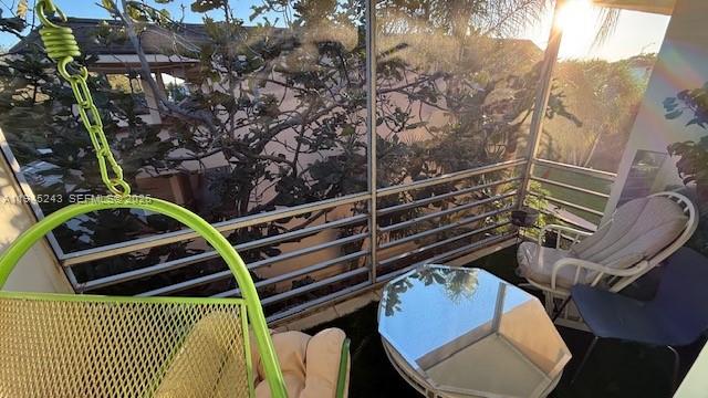 4502 North Federal Highway, Unit 336D Lighthouse Point, FL 33064 - Photo 11 of 12 a view of a chairs and table on the wooden floor