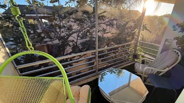 a view of a chairs and table on the wooden floor
