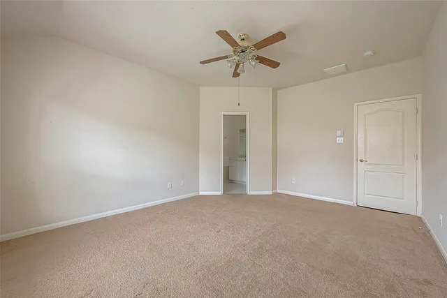 a view of a big room with carpet