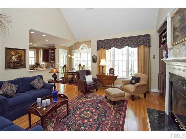 4716 Salem Ridge Road Holly Springs, NC 27540 - Photo 2 of 25 Kitchen is open to the breakfast Room and Family Room. Great for entertaining! Den/Family/Great Room