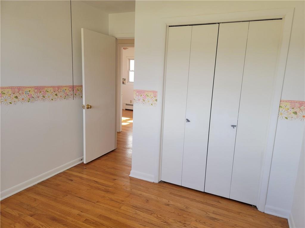877 North 950 East Road Tower Hill, IL 62571 - Photo 17 of 28 a view of an empty room with wooden floor