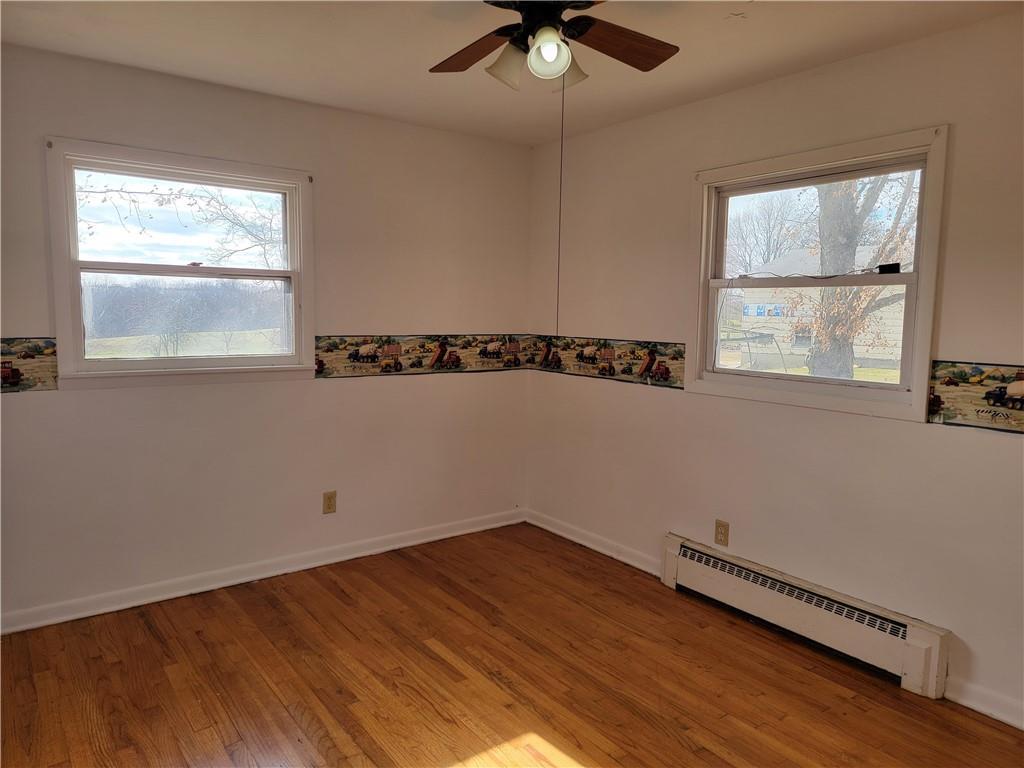 877 North 950 East Road Tower Hill, IL 62571 - Photo 18 of 28 a view of a room with wooden floor and natural light