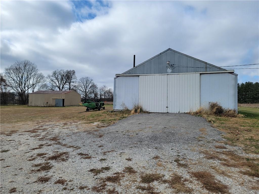 877 North 950 East Road Tower Hill, IL 62571 - Photo 3 of 28 a view of a house with a yard