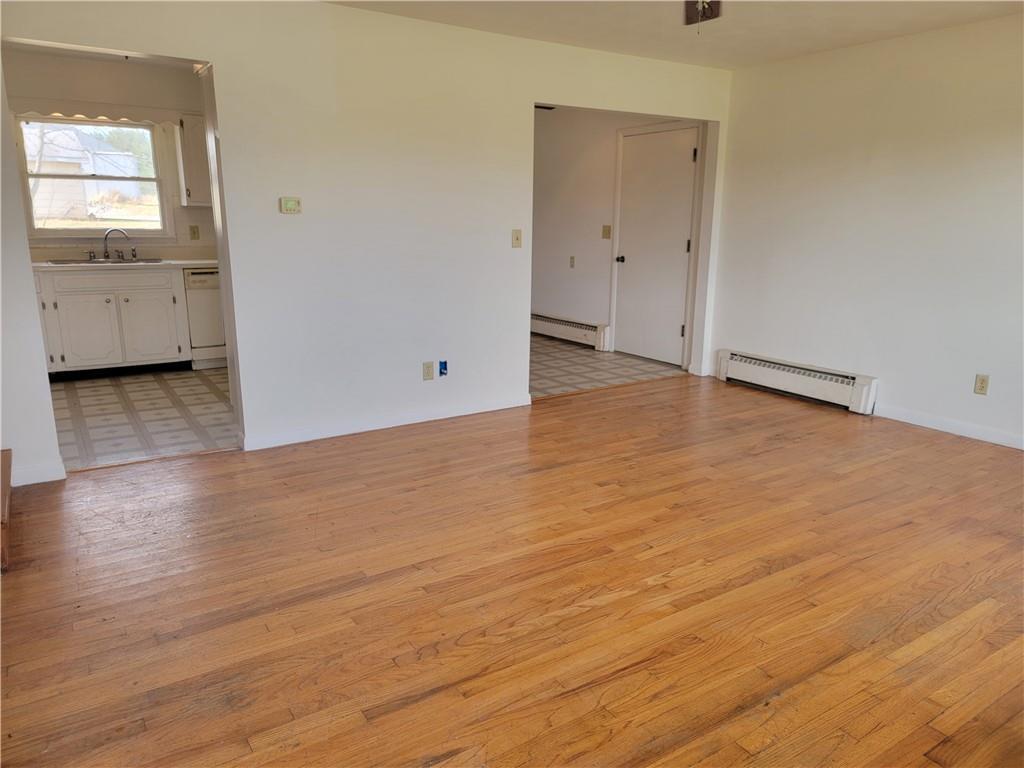 877 North 950 East Road Tower Hill, IL 62571 - Photo 5 of 28 wooden floor in an empty room
