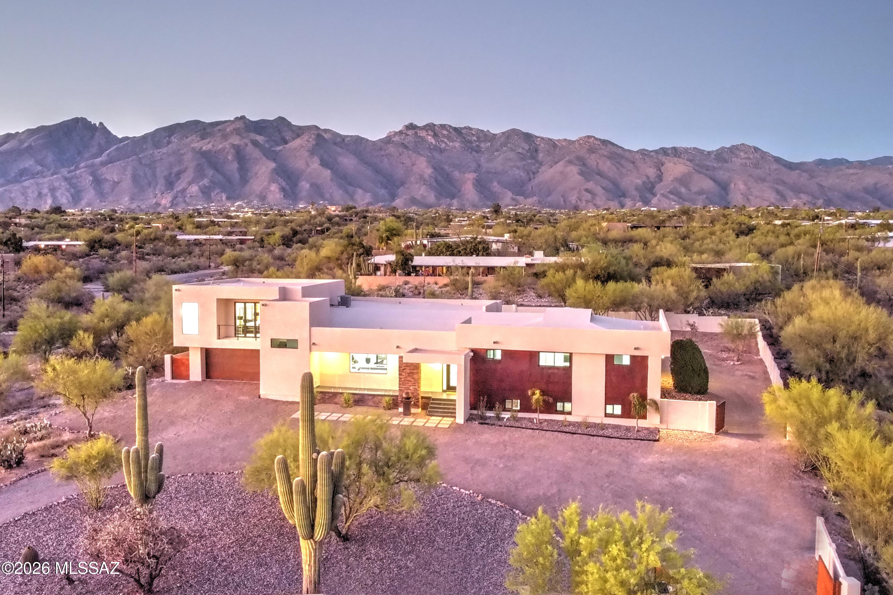 4939 East River Road Tucson, AZ 85718 - Photo 3 of 29 a view of a city with lots of houses