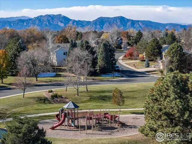 a view of a swimming pool with a balcony