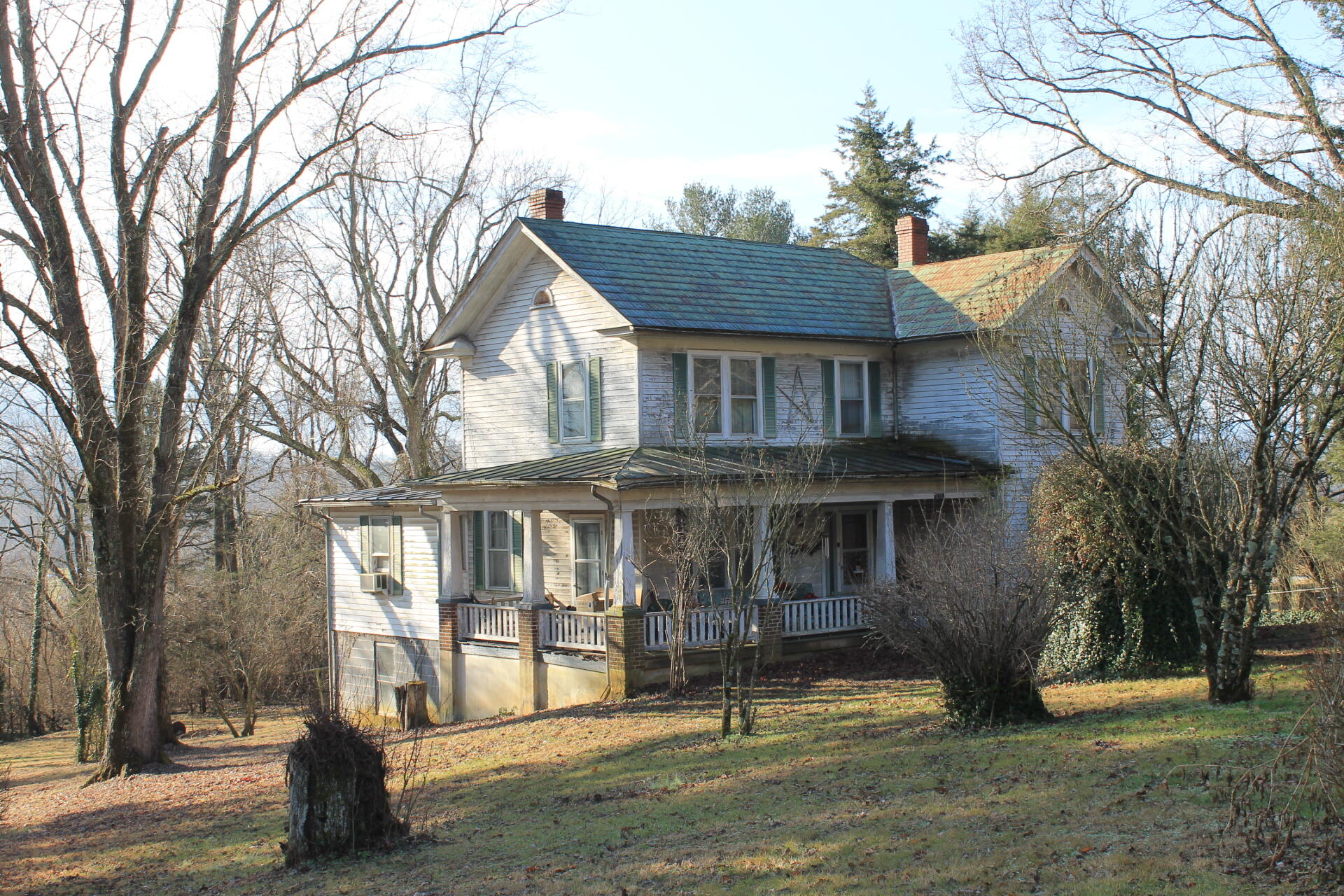 1213 Narrow Passage Road Buchanan, VA 24066 - Photo 1 of 21 a front view of a house with a yard