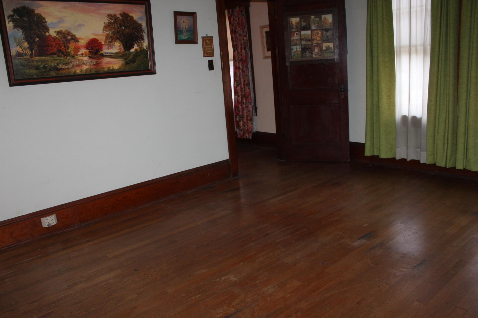 1213 Narrow Passage Road Buchanan, VA 24066 - Photo 8 of 21 a view of a hallway with wooden floor and a fireplace