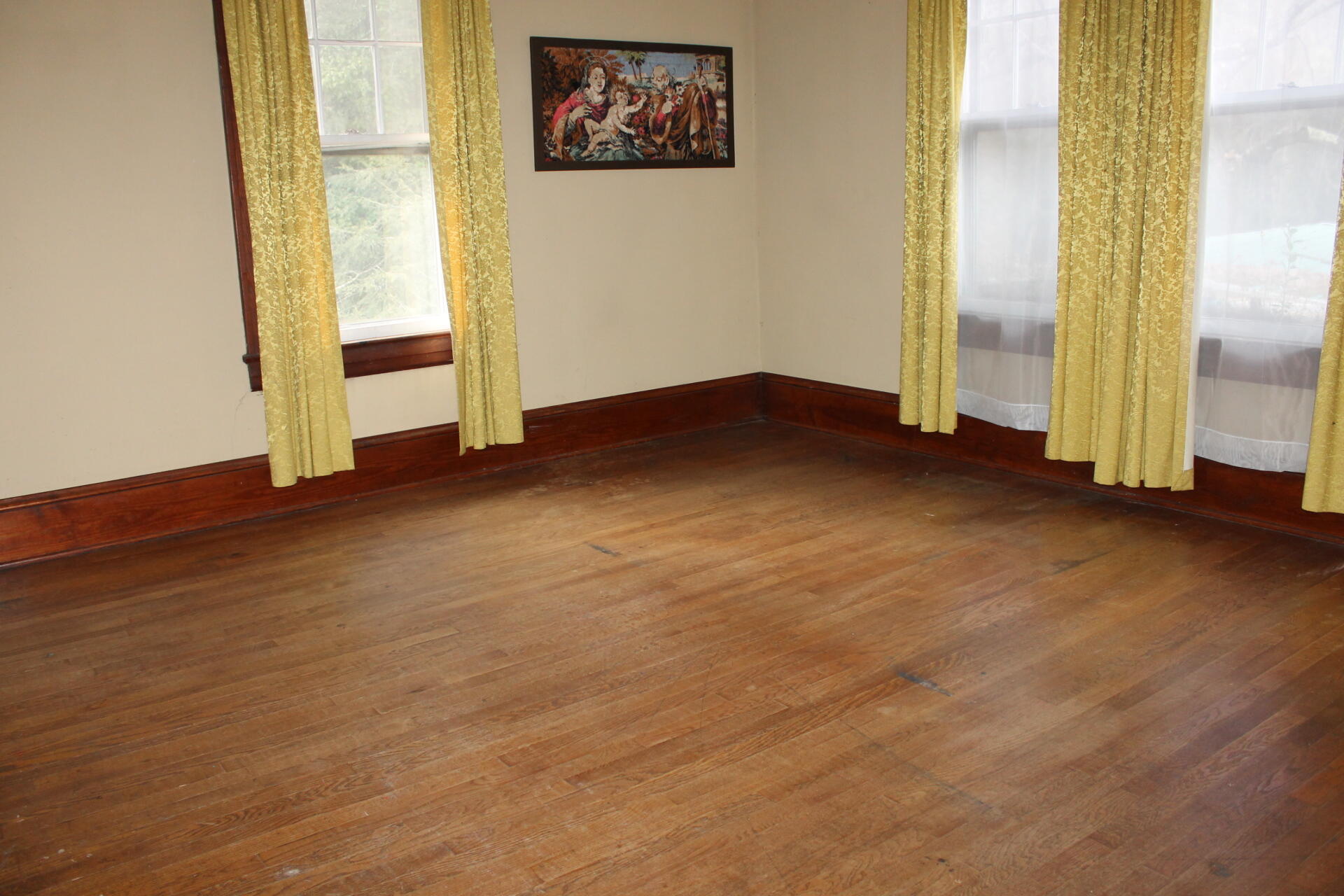 1213 Narrow Passage Road Buchanan, VA 24066 - Photo 9 of 21 an empty room with wooden floor and windows