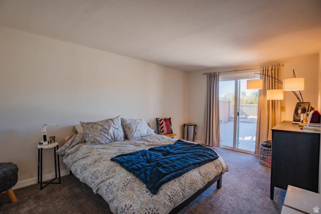 980 Cactus Circle St. George, UT 84790 - Photo 38 of 77 Carpeted bedroom with access to exterior