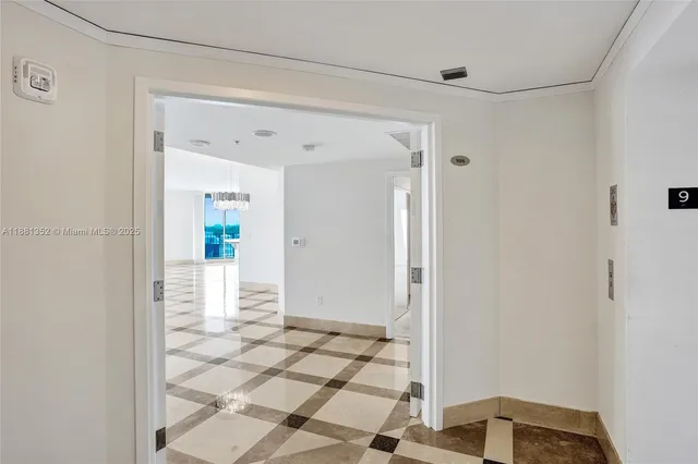 a view of a living room and kitchen