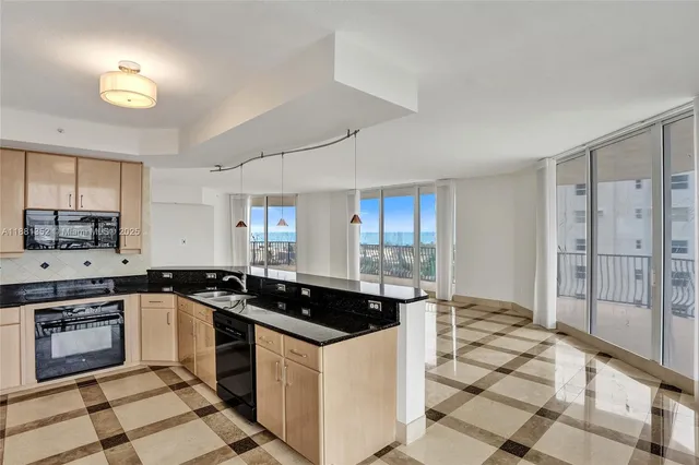a view of bathroom with washer and dryer