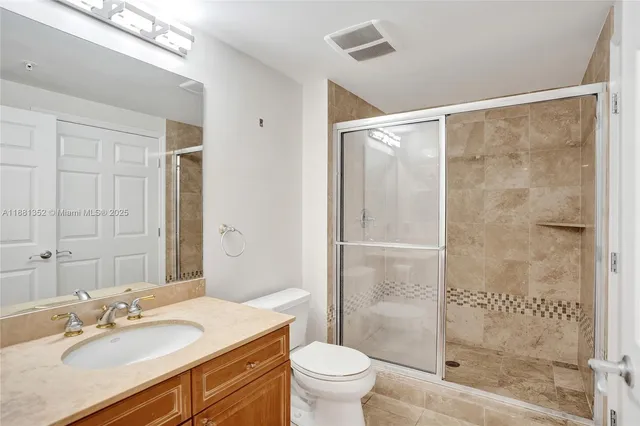 a view of city with tall buildings