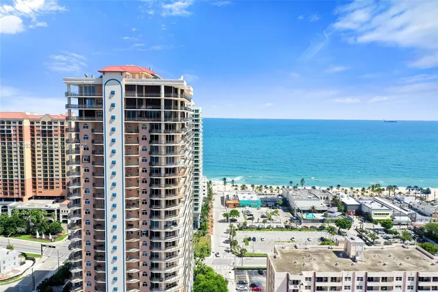 a view of a city with tall buildings