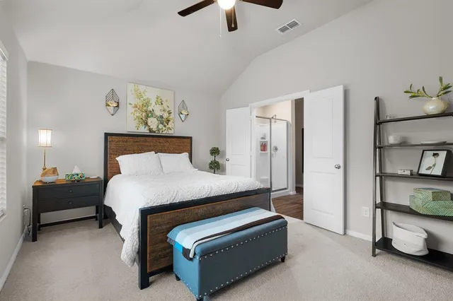 a view of a room with wooden floor and window