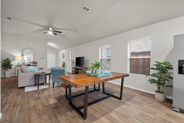 a view of a workspace with furniture