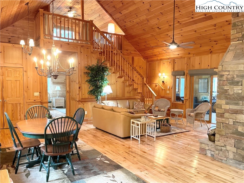 541 Woodland Ridge Lansing, NC 28643 - Photo 18 of 45 a wooden bench sitting in front of a building