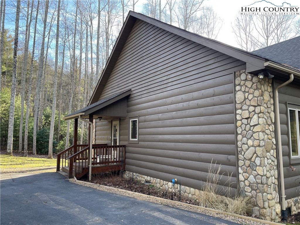 541 Woodland Ridge Lansing, NC 28643 - Photo 10 of 45 a view of a house with backyard and balcony