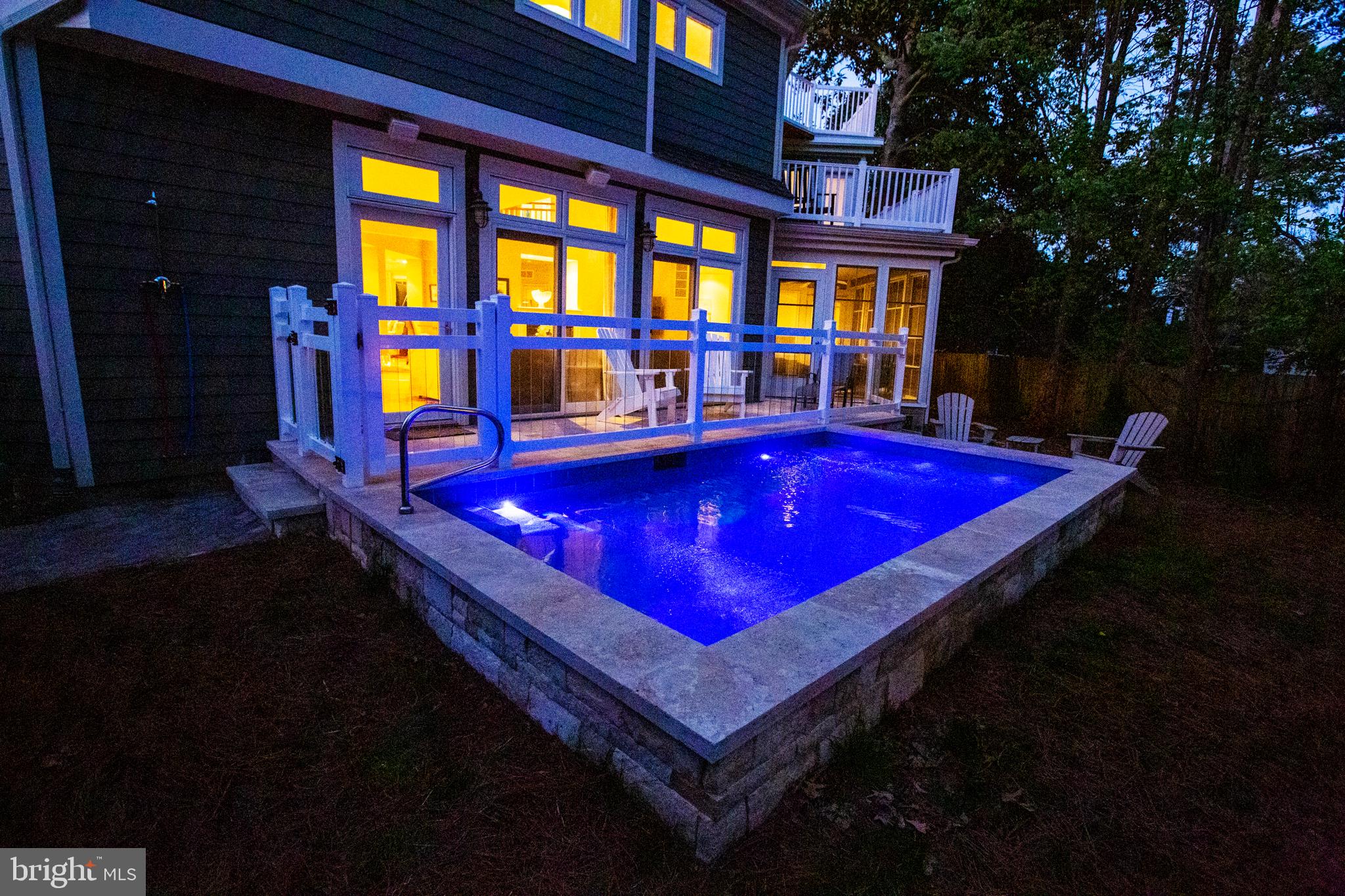 14 Cookman Street Rehoboth Beach, DE 19971 - Photo 8 of 60 Pool at dusk with custom lighting package