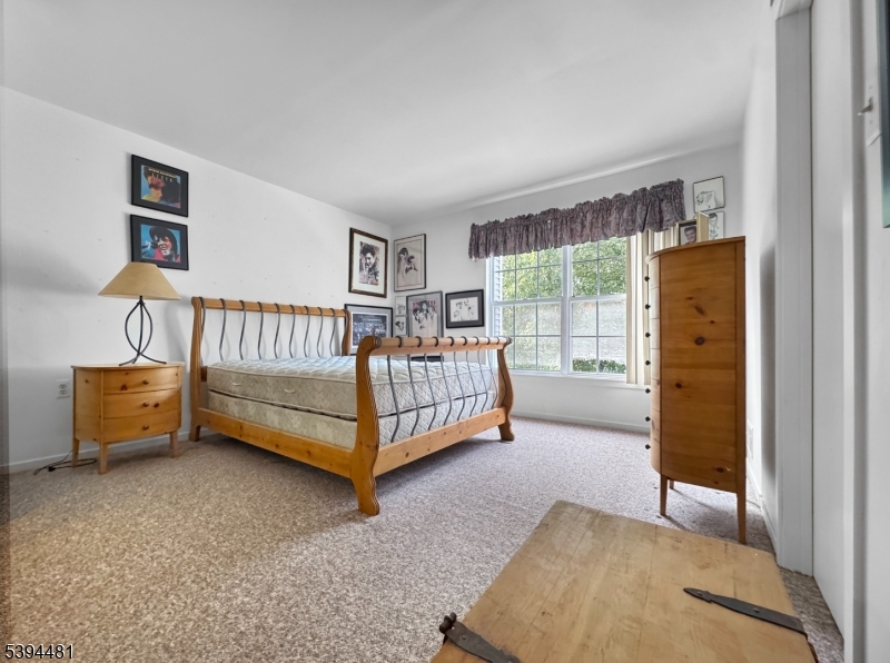 5 Ajax Court Hackettstown, NJ 07840 - Photo 11 of 19 a bedroom with a bed and a window