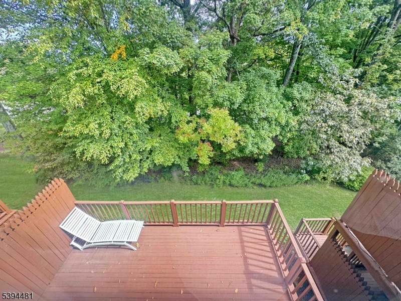 5 Ajax Court Hackettstown, NJ 07840 - Photo 16 of 19 a view of a chair and tables on the wooden floor