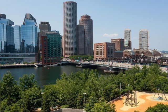 a view of a city with tall buildings