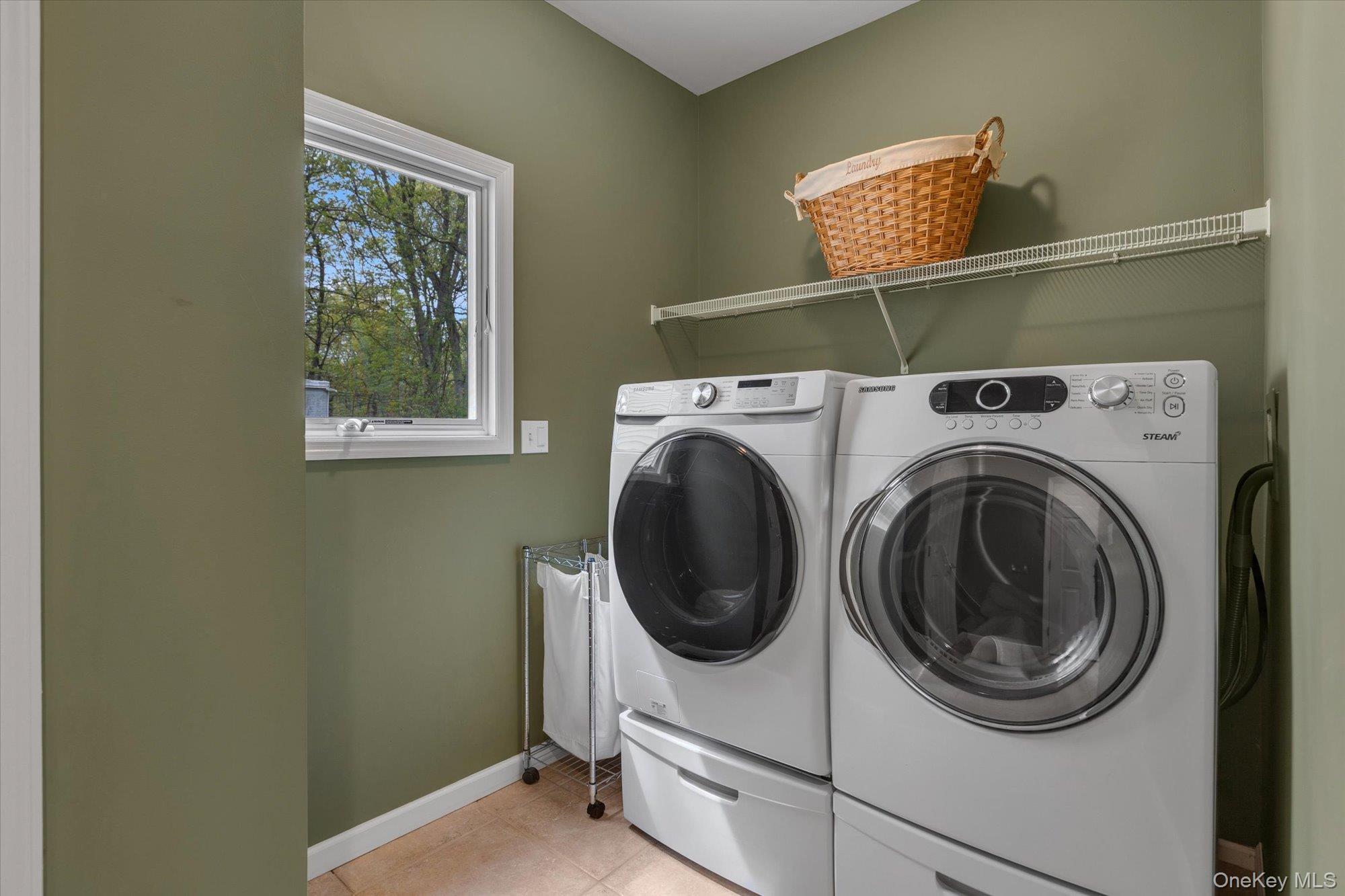 263 Old Commack Road Kings Park, NY 11754 - Photo 13 of 42 a utility room with dryer and washer