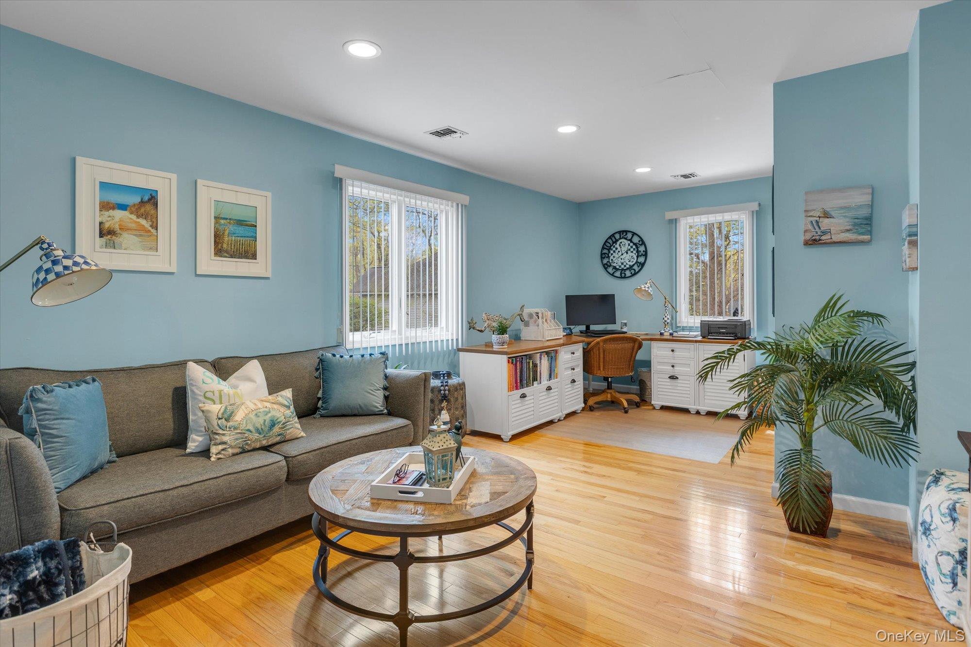 263 Old Commack Road Kings Park, NY 11754 - Photo 21 of 42 a living room with furniture and a wooden floor
