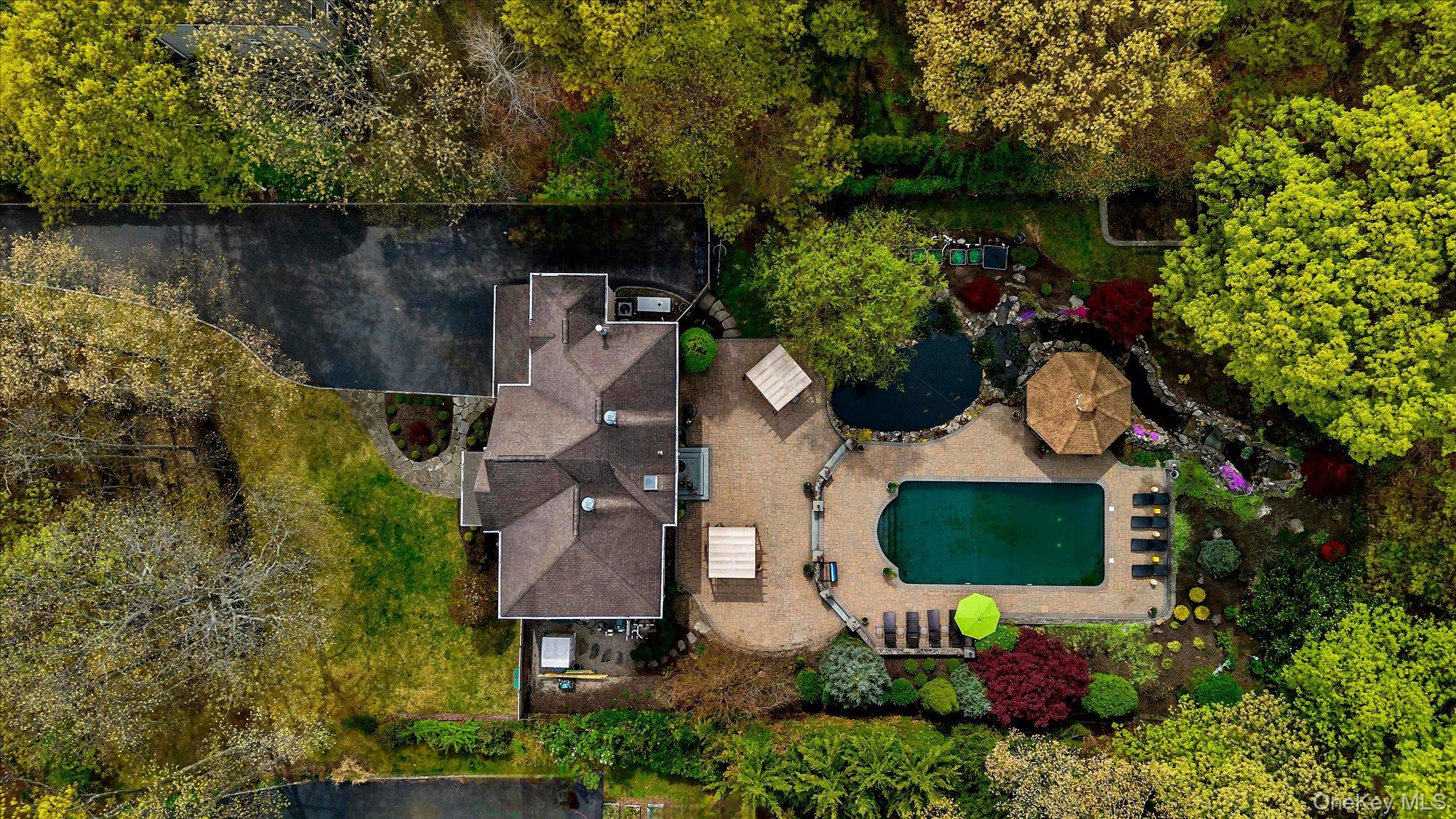 263 Old Commack Road Kings Park, NY 11754 - Photo 33 of 42 an aerial view of house with yard swimming pool and outdoor seating